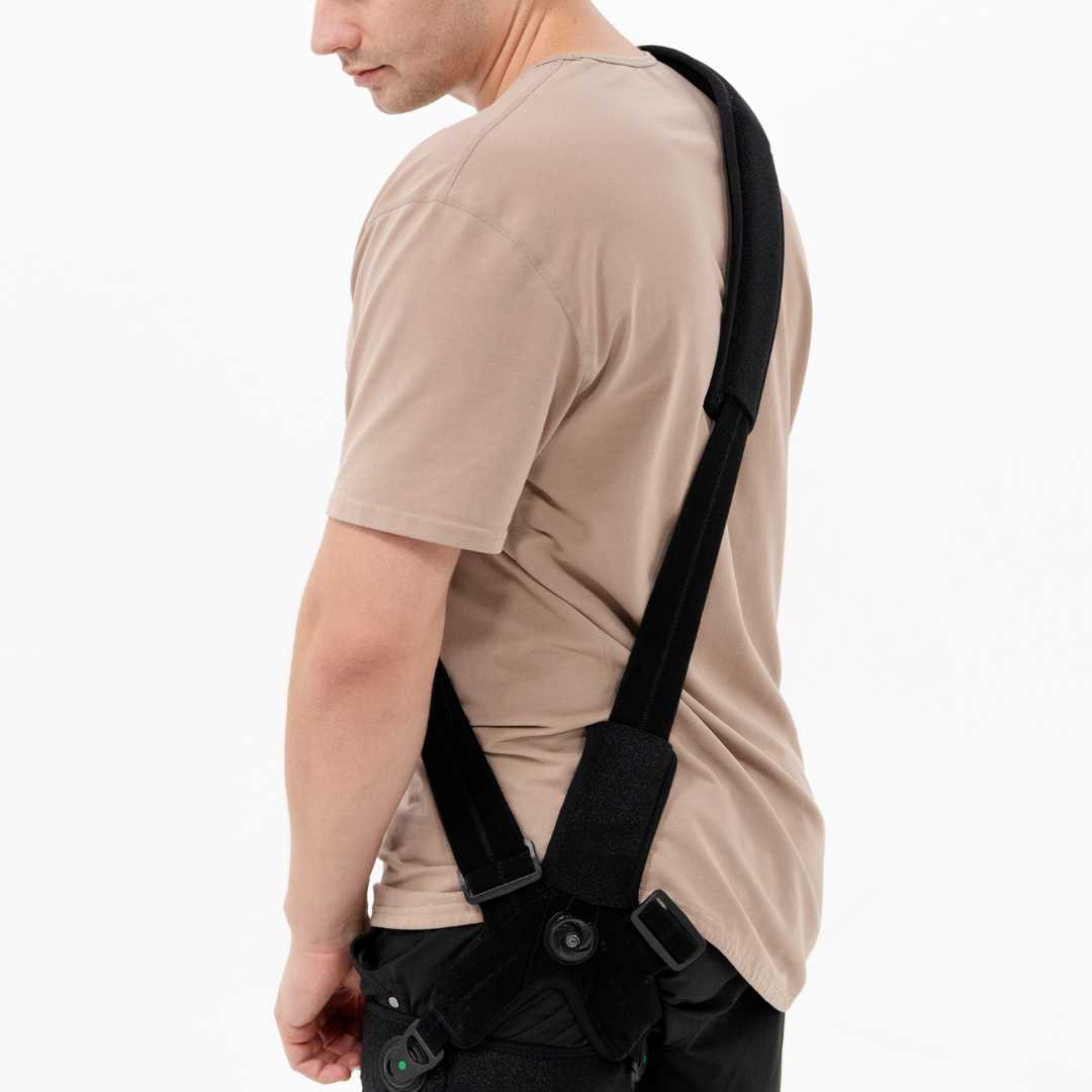 A person wearing the Shoulder Rehab Brace